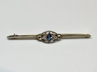 Broche or 750 topaze