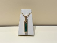 Pendentif or 750 émeraudes 