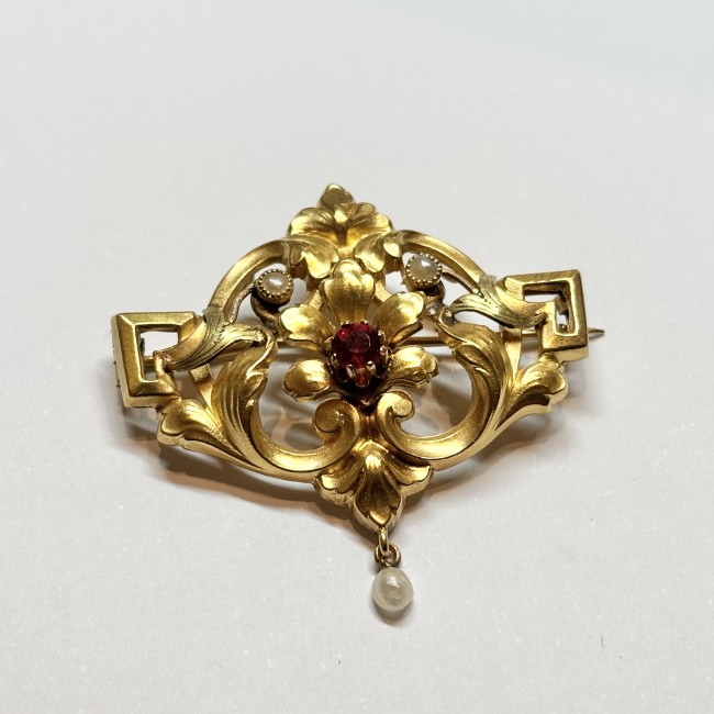 Broche or 750 