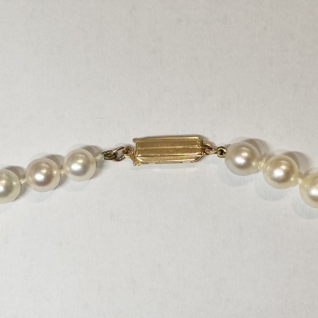 Collier chute de 63 Perles & fermoir or jaune 750