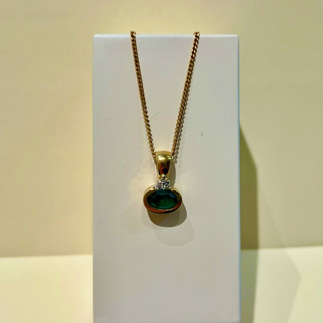 Pendentif or 750 emeraude